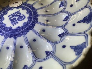 A Chinese blue and white lotus-molded dish, Kangxi mark and of the period